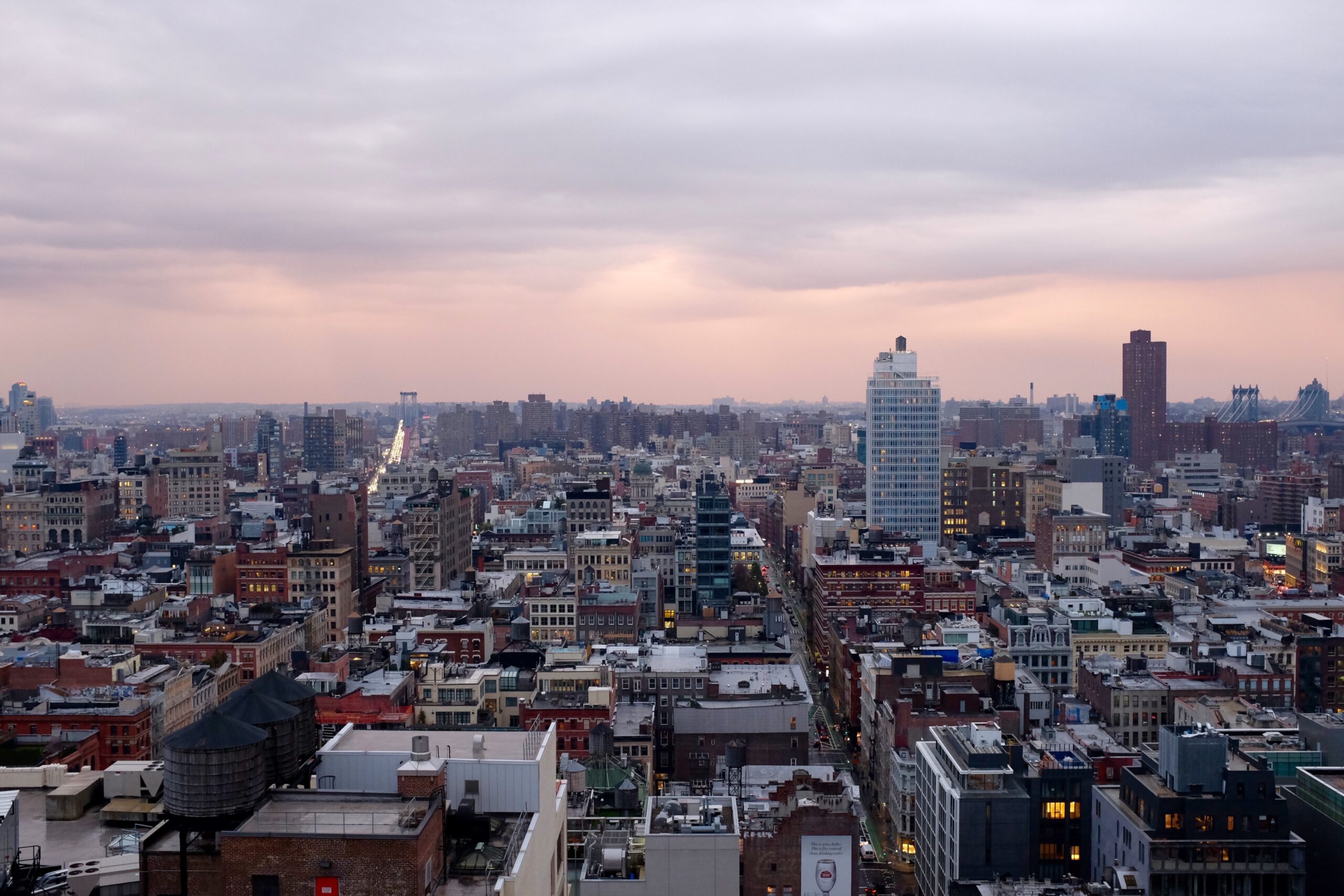 A sweeping view of the Hudson Square neighborhood in Manhattan at dusk, showcasing the vibrant skyline and city streets where many locals and visitors search for a trusted dispensary near Hudson Square.